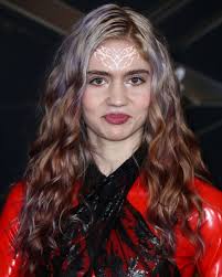 Grimes Face Tattoo: A Bold Statement or Just Art?